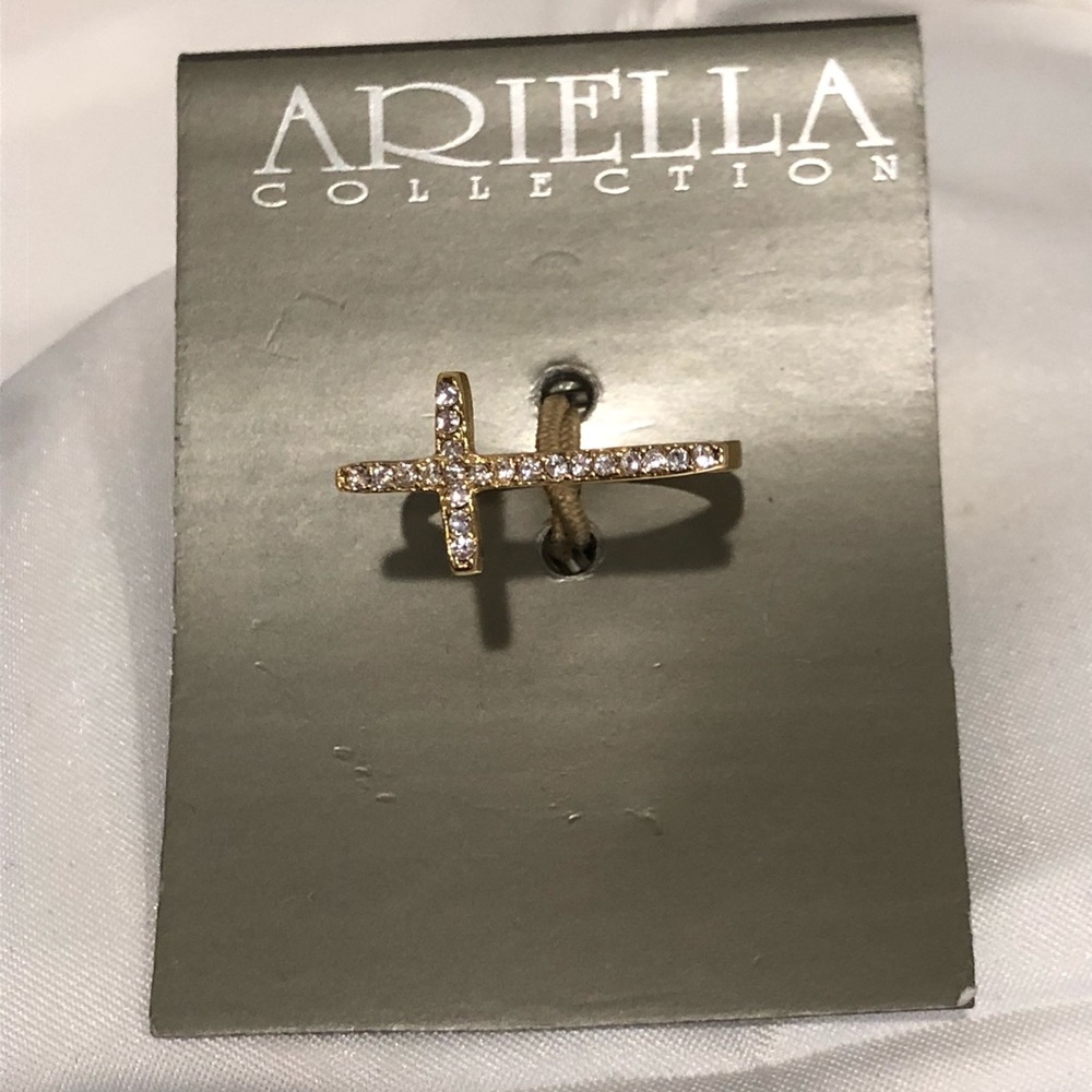 New Ariella gold cross ring.